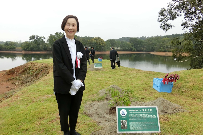 Tomoko Watanabe at the 2019 planting ceremony of a second-generation sapling from the survivor Camphor tree