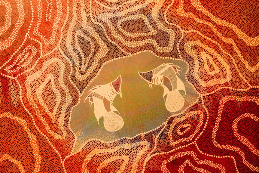 Two barramundi painted in a cross hatch style, surrounded by a landscape set out in a dot painting style.
