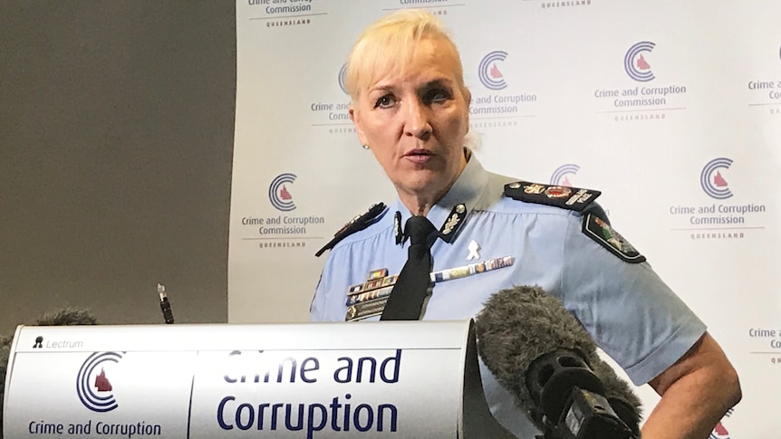 Qld Police Commissioner Katarina Carroll speaks at a media conference at a CCC podium.