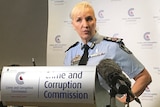 Qld Police Commissioner Katarina Carroll speaks at a media conference at a CCC podium.