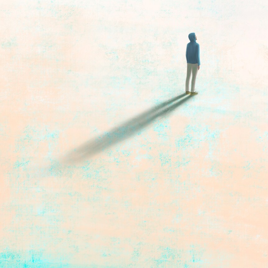 Artwork of a man in a hoodie standing all alone on a blank surface, shadow stretching across the blank ground.