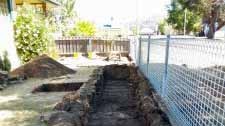 A trench is dug in the historic Tasmanian town of Oatlands during an archaeology dig to find the 1830s jail.