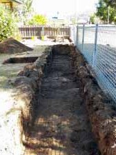 A trench is dug in the historic Tasmanian town of Oatlands during an archaeology dig to find the 1830s jail.
