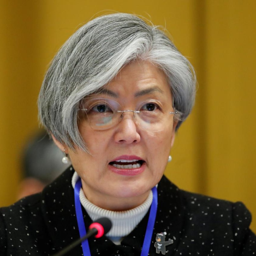 Close up of South Korean Foreign Minister Kang Kyung-Wha against a yellow background
