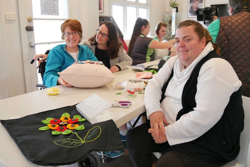 Women participate in craft class at the New Horizons Club in Launceston