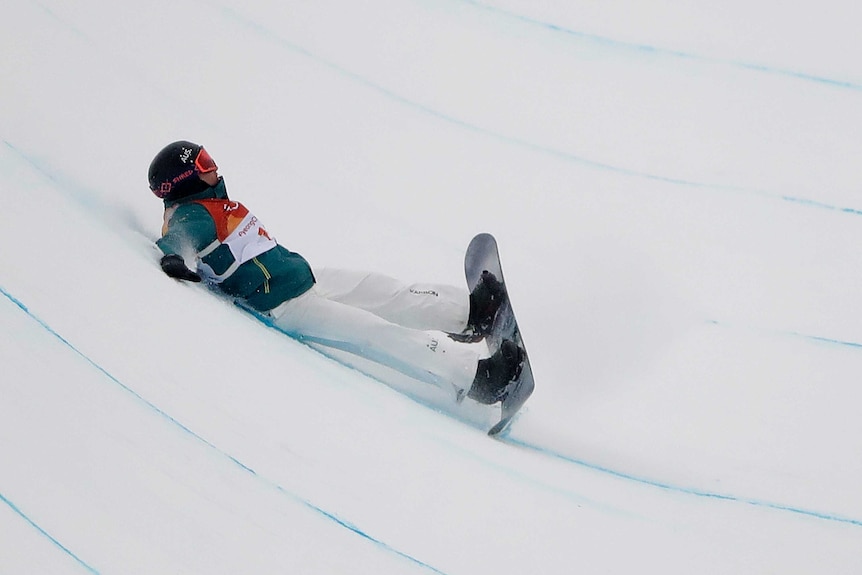 Kent Callister crashes during the men's snowboard halfpipe final at the Olympic Winter Games.