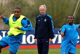 Sven-Goran Eriksson watches his players train at Carrington in Manchester