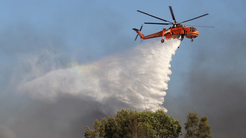 Helicopter fights Doyalson grassfire