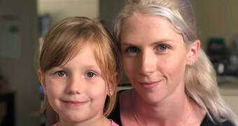 Emma Taylor holds her six year old daughter Felicity