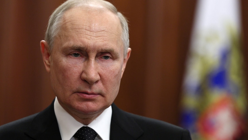 Russian President Vladimir Putin gives a televised address.