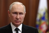 Russian President Vladimir Putin gives a televised address.