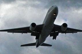 Image of plane flying overhead