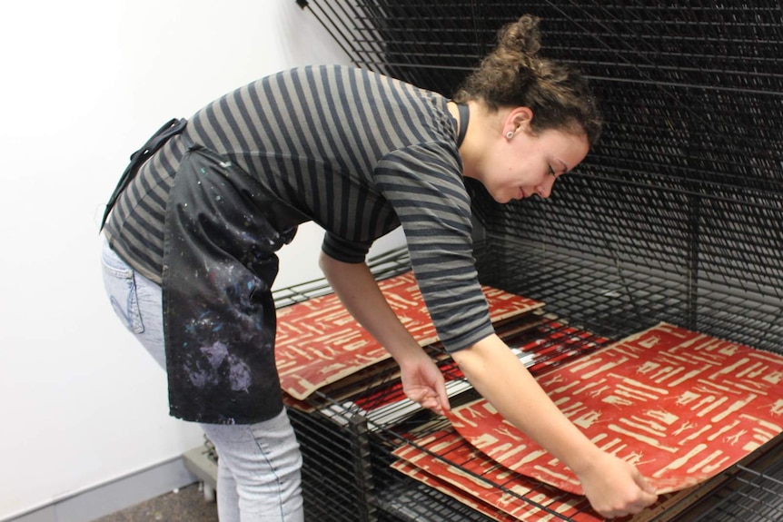 Miriam Slater with printed wrapping paper at the Megalo Print Studio and Gallery, Canberra, November 2015.
