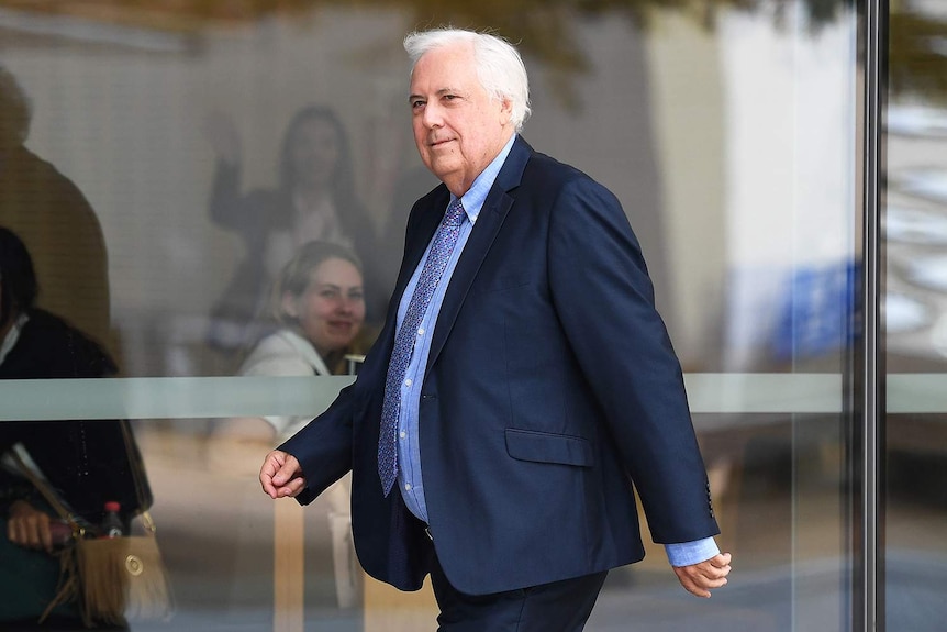 Businessman and former federal MP Clive Palmer arrives at the Supreme Court in Brisbane on August 3, 2017.