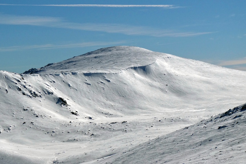 A mountain covered in snow.