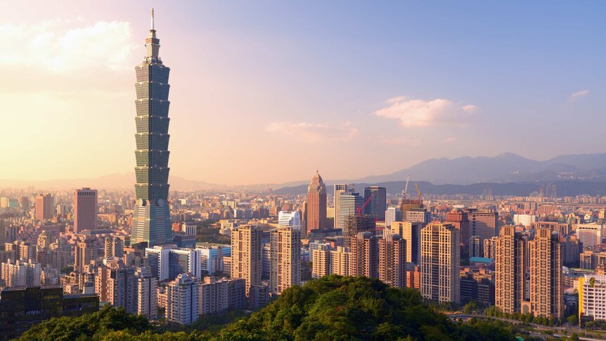 The Taipei skyline depicts a metropolis.