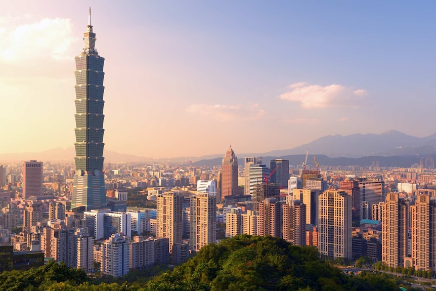 The Taipei skyline depicts a metropolis.