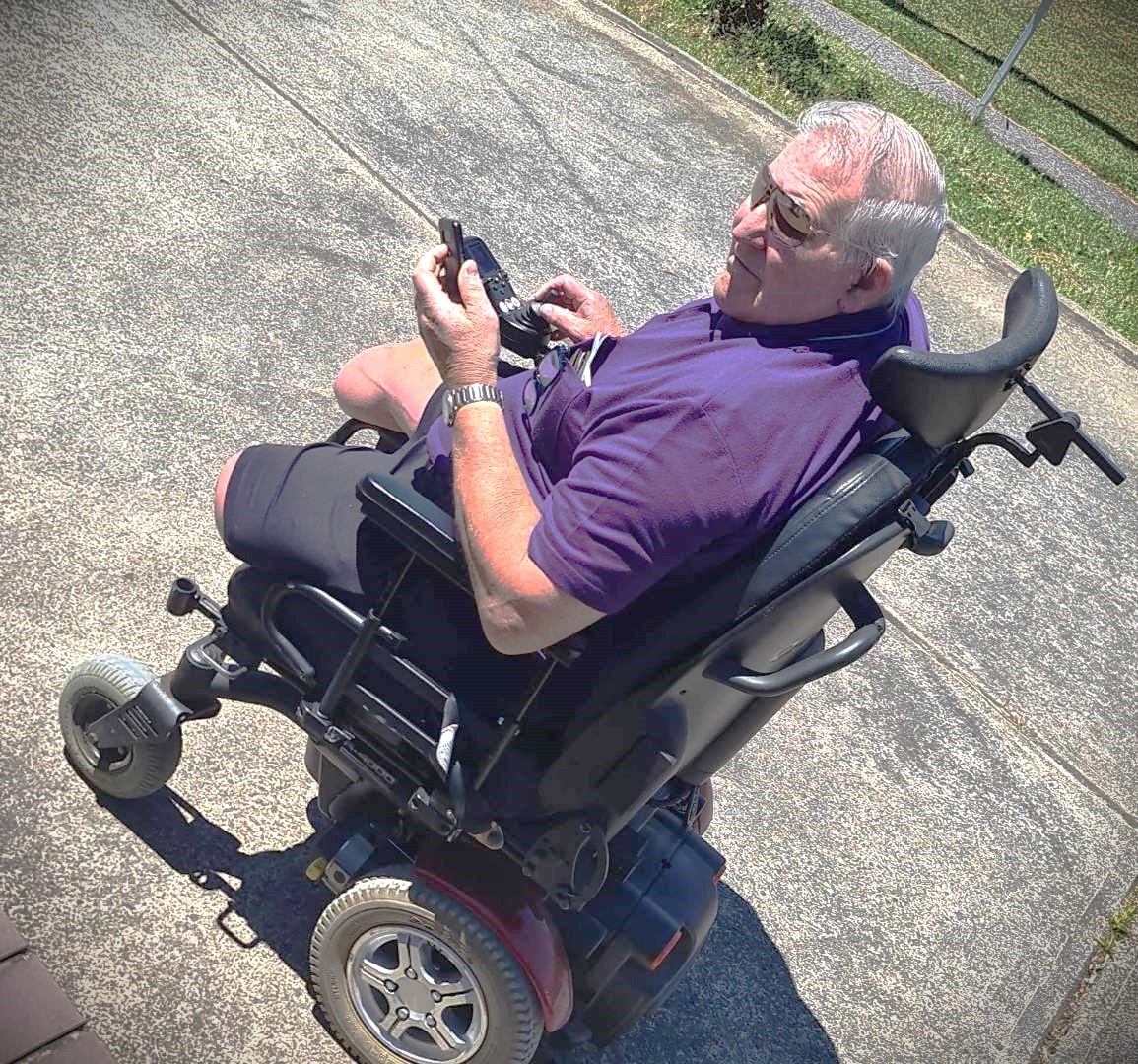 Robert 'Bob' East, pictured in a motorised wheelchair