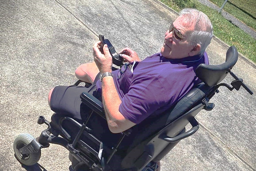 Robert 'Bob' East, pictured in a motorised wheelchair