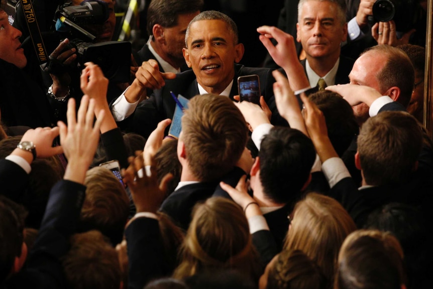 Barack Obama arrives at Congress for final State of the Union address