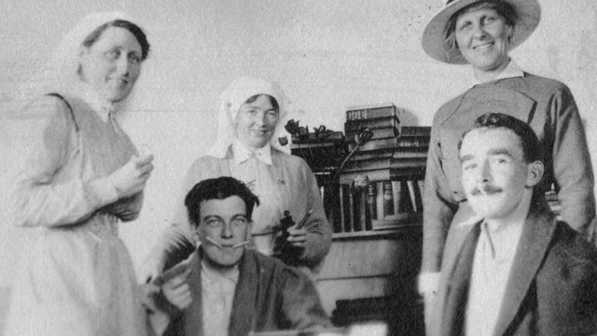 Ida Greaves, matron of the Australian Voluntary Hospital, with nurses and patients