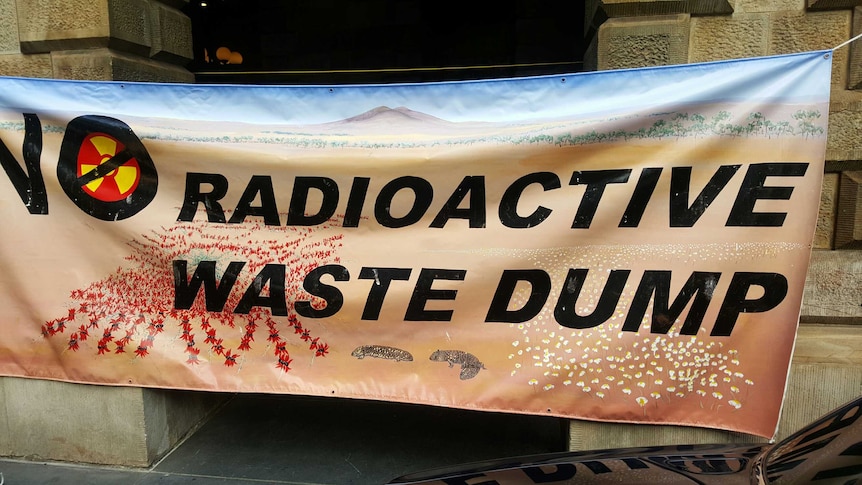 A banner opposing a proposed nuclear waste dump unfurled at the Adelaide Town Hall