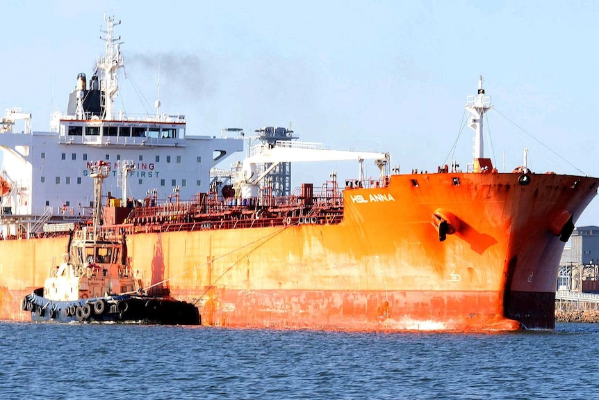 A large ship leaving port.