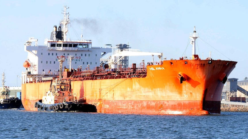 A large ship leaving port.