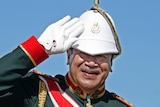 Tonga's king George Tupou saltues - file photo
