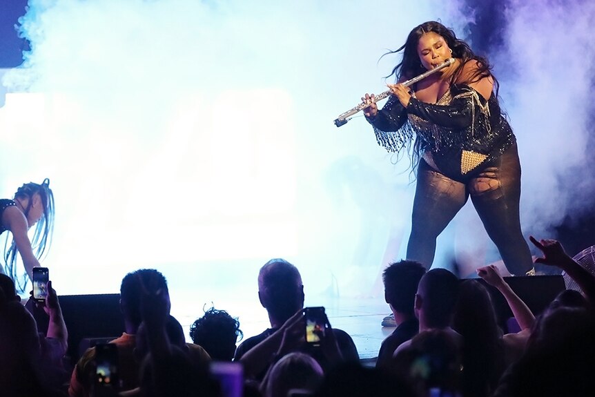 Lizzo plays the flute at the Sydney Opera House