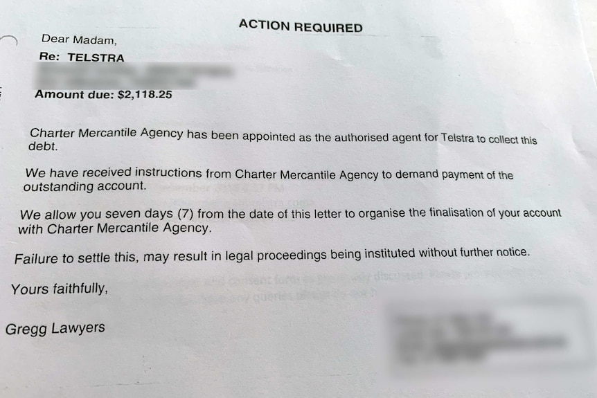 A legal letter headed "action required" demanding payment for a debt of $2,118.