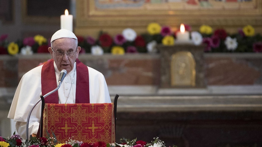 Pope Francis speaking at the pulpit