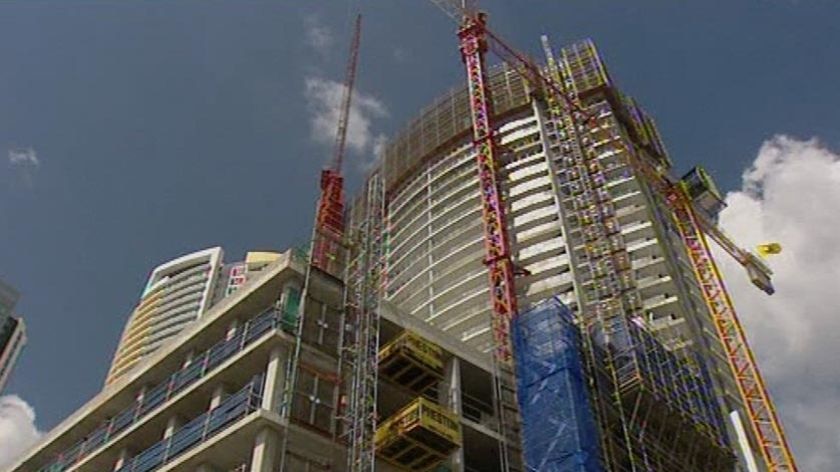 TV still of construction site of a $700m Hilton Hotel on the Gold Coast of the Raptis Group.