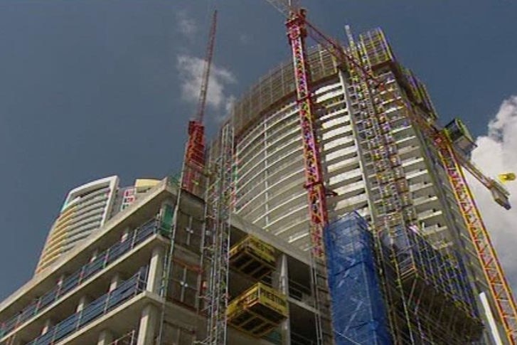 TV still of construction site of a $700m Hilton Hotel on the Gold Coast of the Raptis Group.