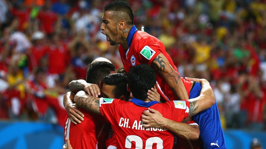 Chile celebrates its second goal against Australia