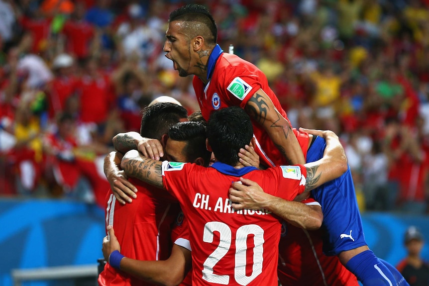 Chile celebrates its second goal against Australia