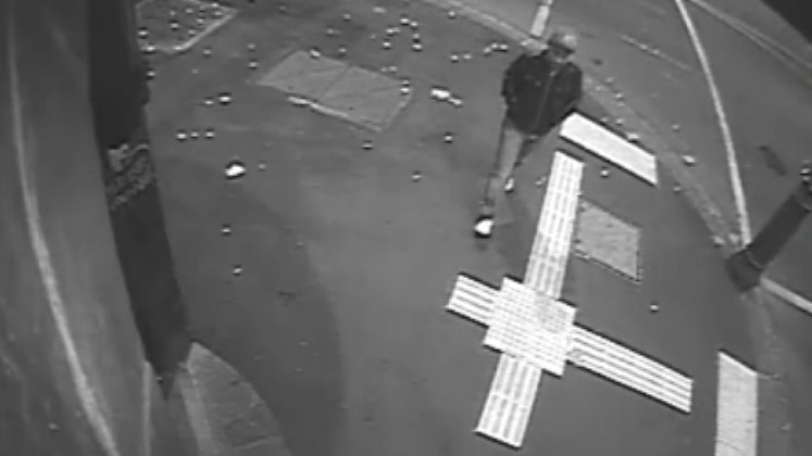 CCTV footage captures 'person of interest' in North Melbourne laneway attack