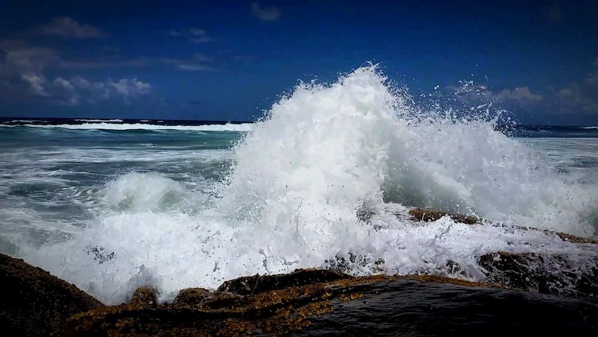 Surf where boy was caught in rip, near Crowdy Head