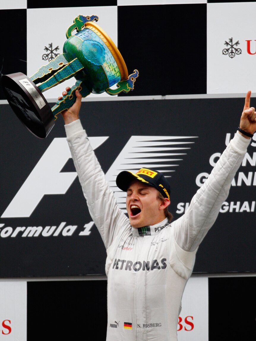 Maiden victory ... Nico Rosberg celebrates in Shanghai.