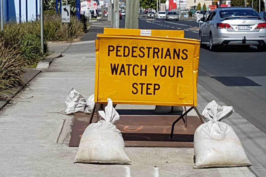 Watch your step council work sign