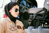 Captain Niloofar Rahmani with headphone and sunglasses on