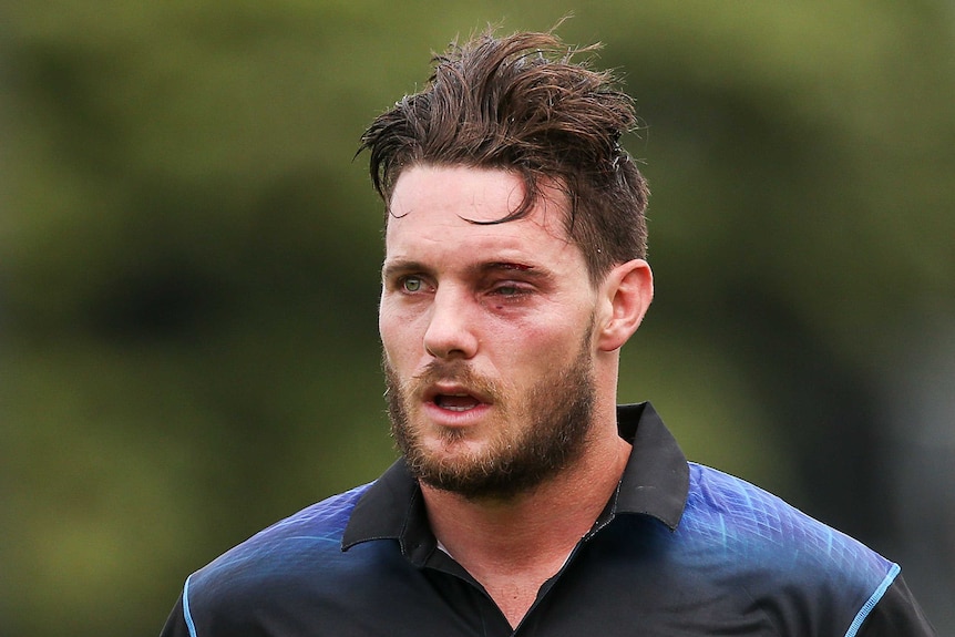 Black Caps' Mitchell McClenaghan leaves the field with an injured eye