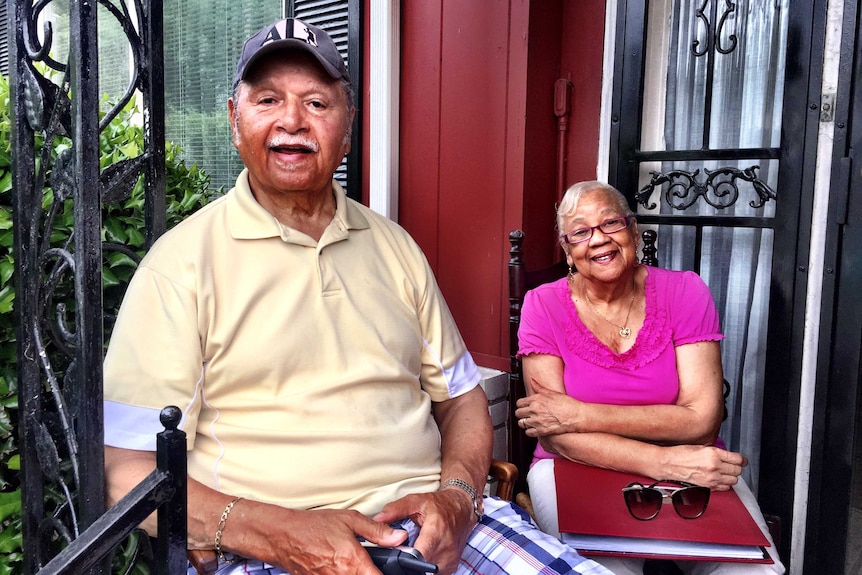 Lawrence and Violet Montgomery sit outside their house, which is opposite Ali's childhood home