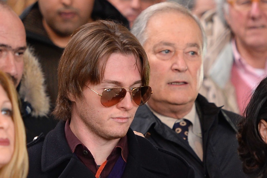 Raffaele Sollecito leaves court during retrial