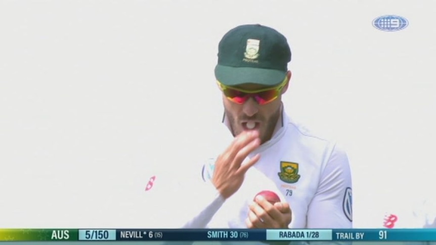 Cameras appear to show Faf du Plessis using a mint to help shine the ball.