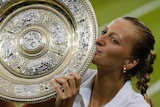 Petra Kvitova kisses Wimbledon trophy