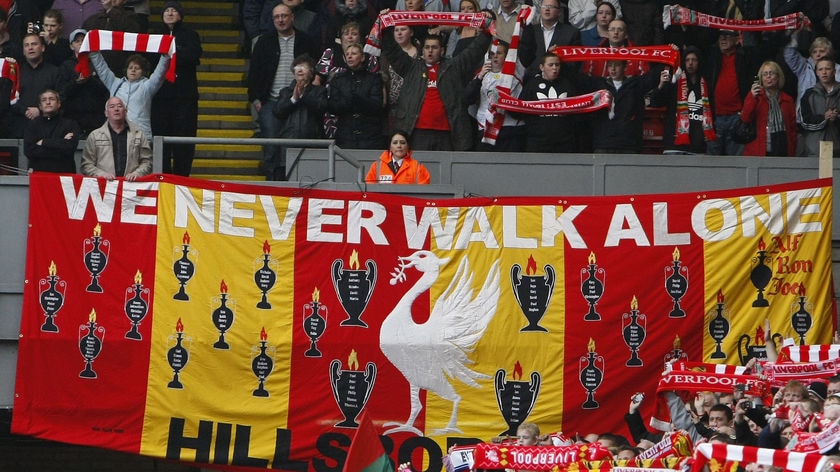 Liverpool fans band together at Anfield in 2009 during a memorial service to mark the 20th anniversary of the disaster.