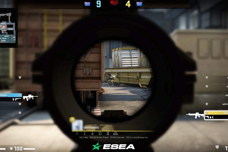 Screen capture of gameplay from Counter-Strike video game, with various graphics surrounding central view through a gun's scope