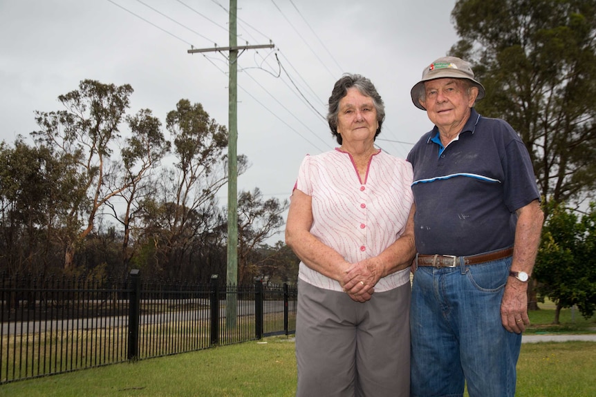 Max and Isabel Lindsay stand outside their property.