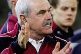 Leigh Matthews addresses the Brisbane players at the MCG in June 2006.